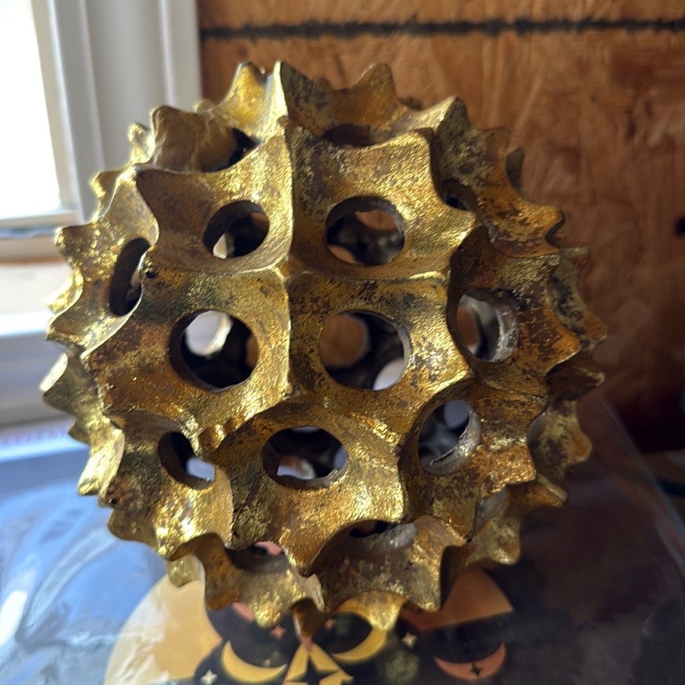 Three Hands gold orb decor appropriate 7” across 21” circumference